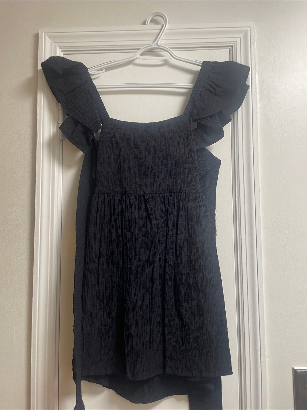Black dress with tie back and pockets